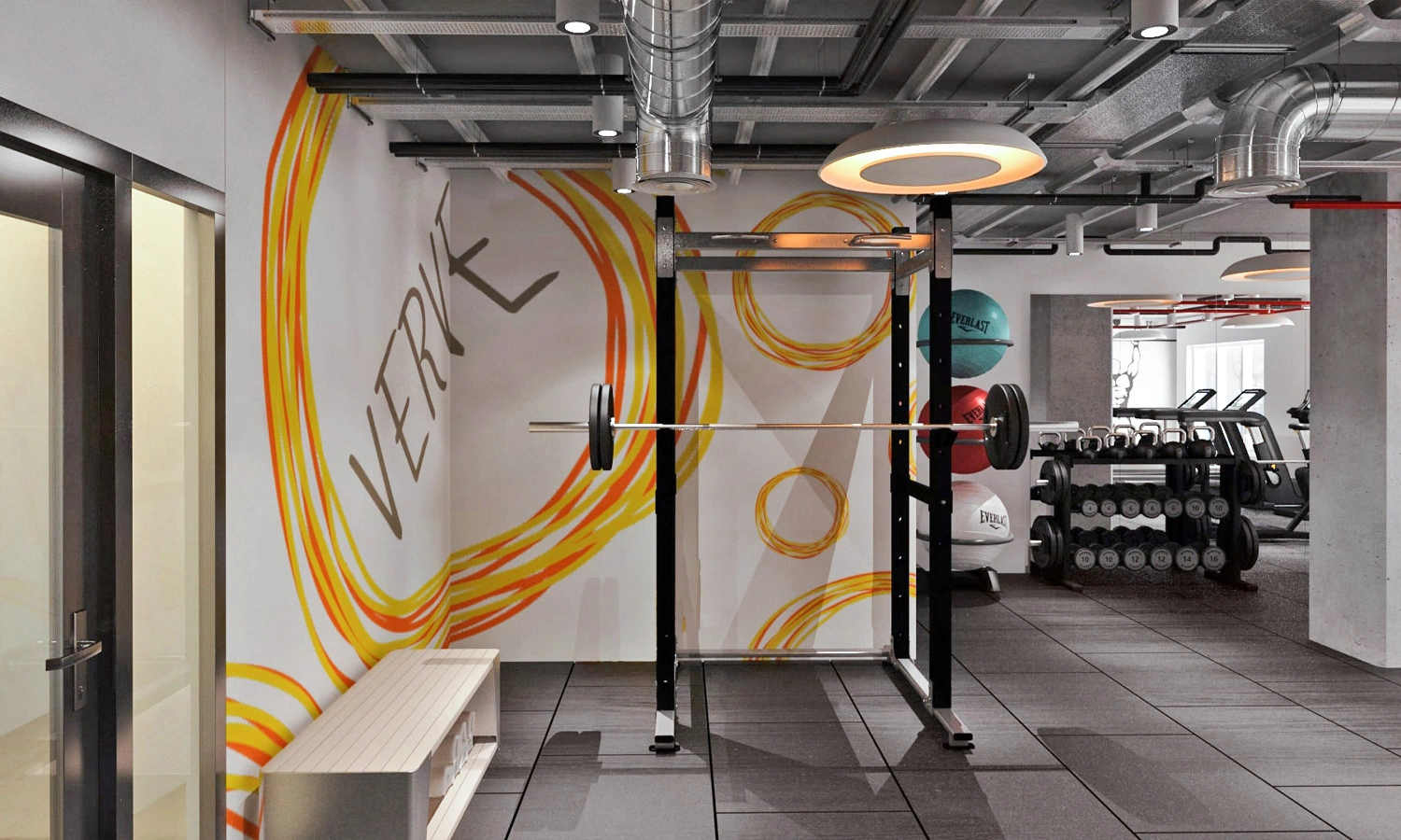 Modern gym with vibrant mural and functional equipment for dynamic fitness experiences.