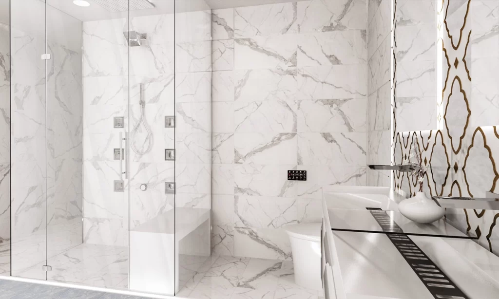 Luxurious modern bathroom featuring white marble and sleek fixtures for a serene atmosphere.