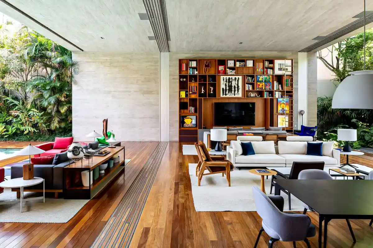 Modern living space blending indoor comfort with outdoor tranquility in Ibsen House, Brazil.