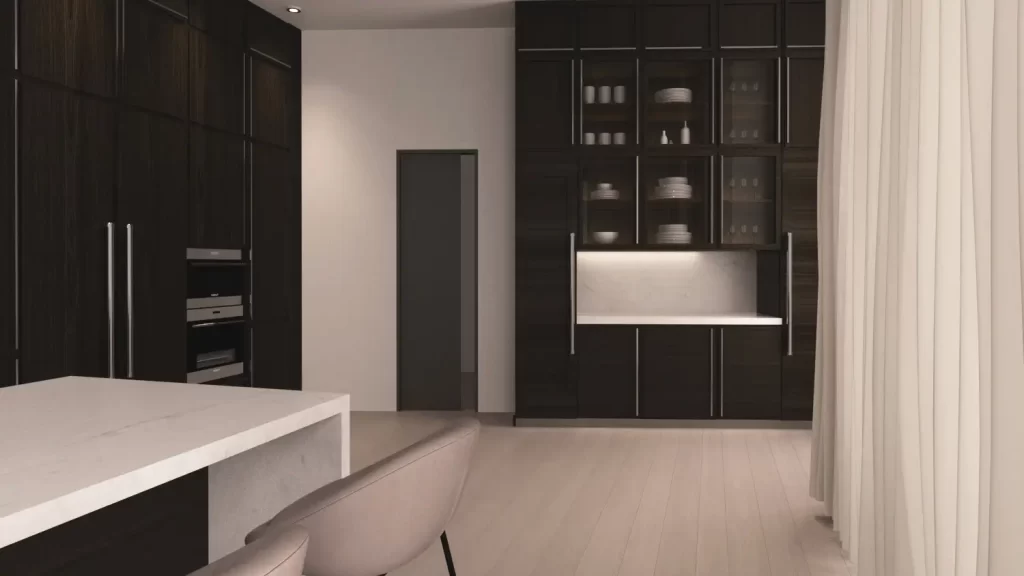 Stylish minimalist kitchen featuring dark cabinetry and a bright white countertop for modern elegance.