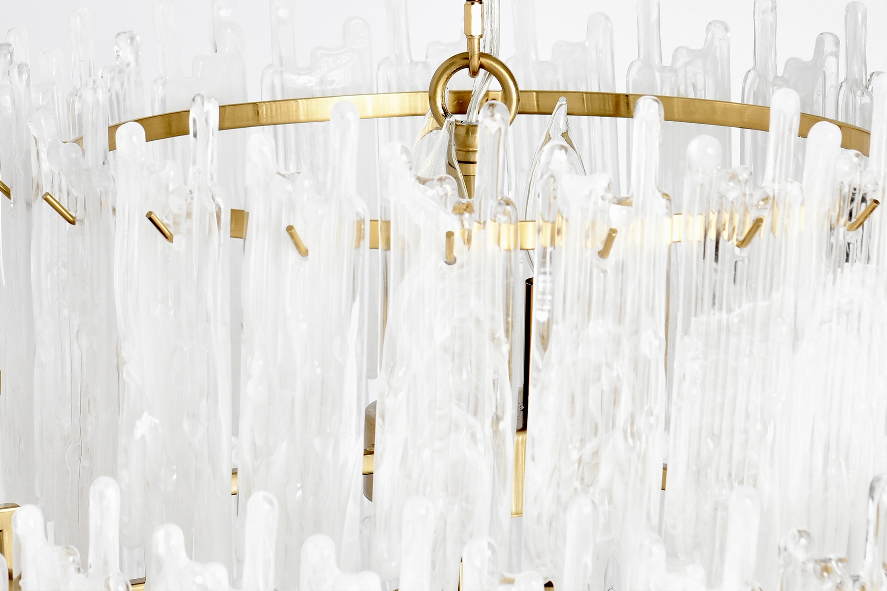 Sophisticated modern chandelier featuring glass accents and a luxurious metal frame.