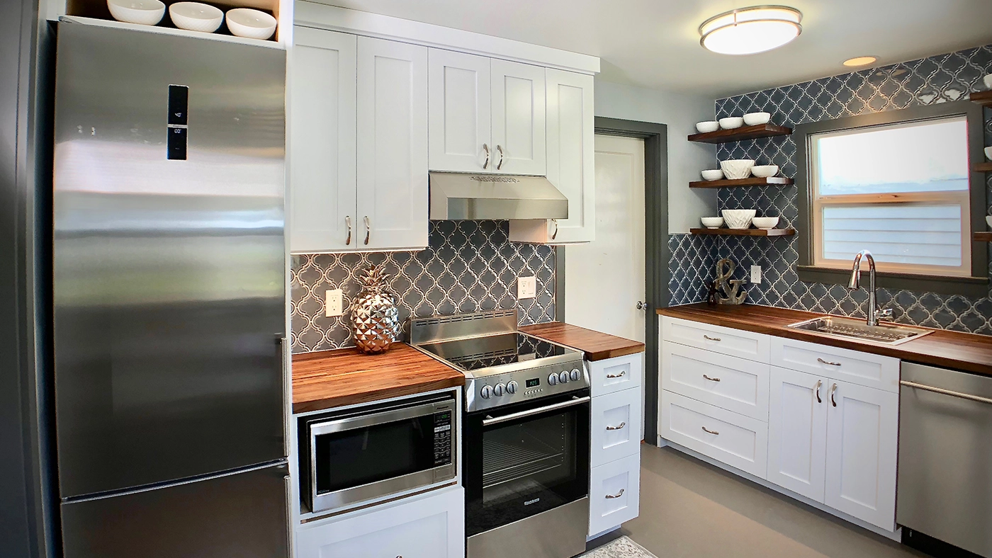 Modern kitchen design featuring sleek appliances, stylish cabinetry, and inviting natural light.