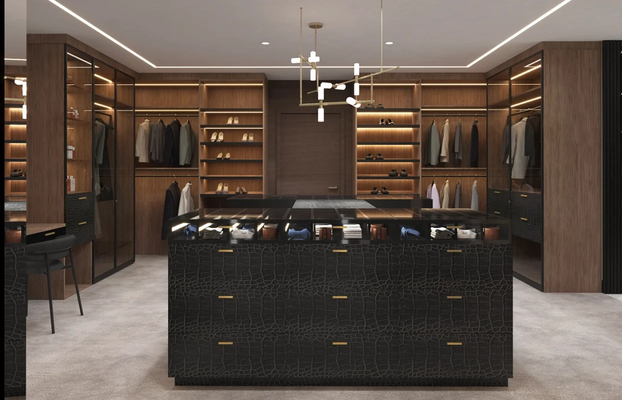 Elegant modern walk-in closet with luxurious cabinetry and stylish accessories.