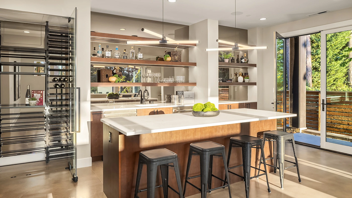 Modern kitchen design featuring spacious layout, sleek island, and integrated indoor-outdoor living.