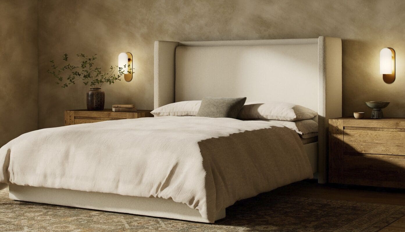 Serene minimalist bedroom with cozy bedding, warm wooden nightstands, and inviting natural decor.