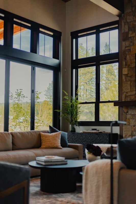 A stylish and comfortable living area at the Suncadia Grand Retreat, featuring modern furniture, ambient lighting, and elegant decor.
