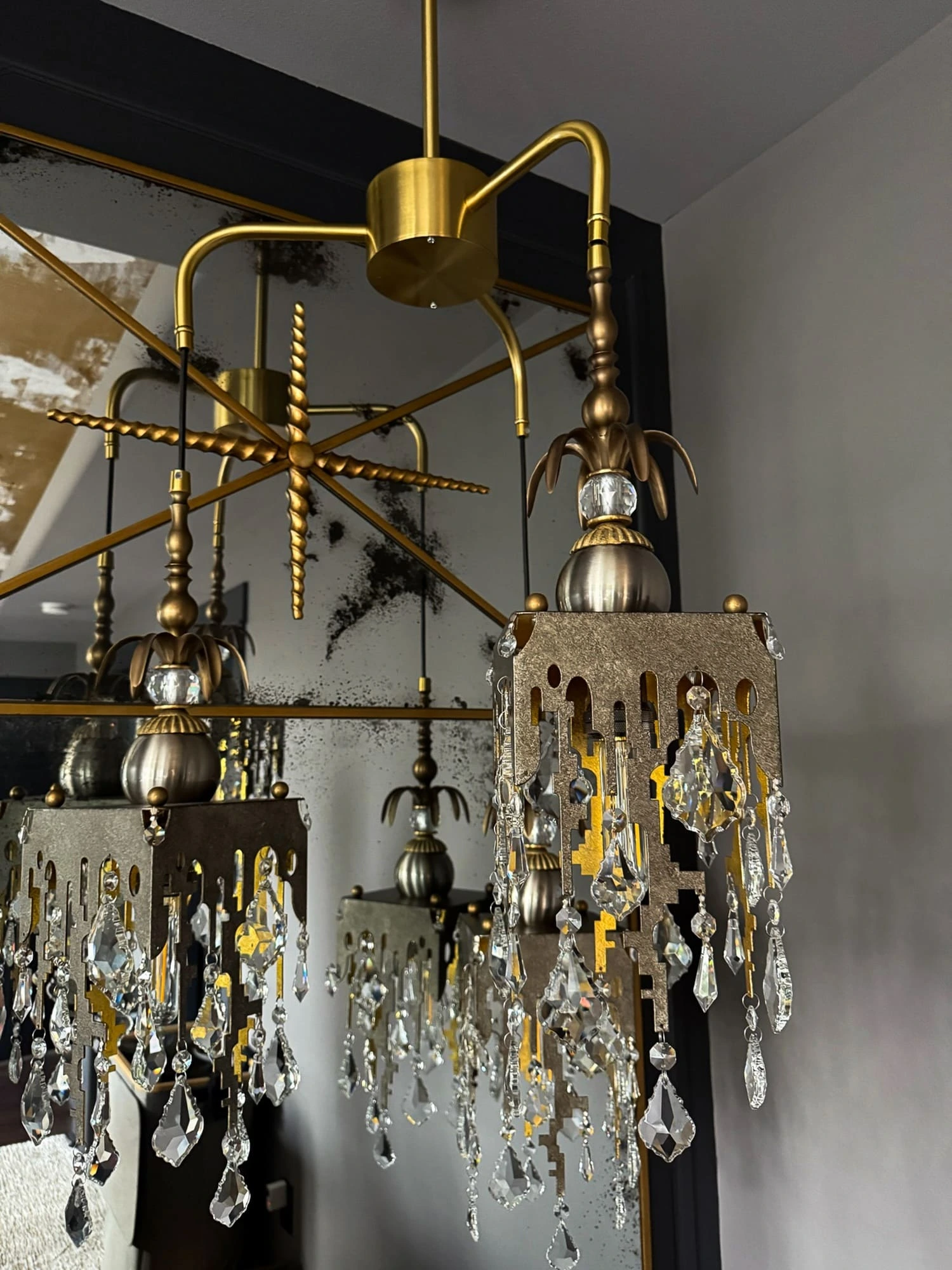 Elegant chandelier design with modern vintage charm and sparkling crystal accents enhances any space.