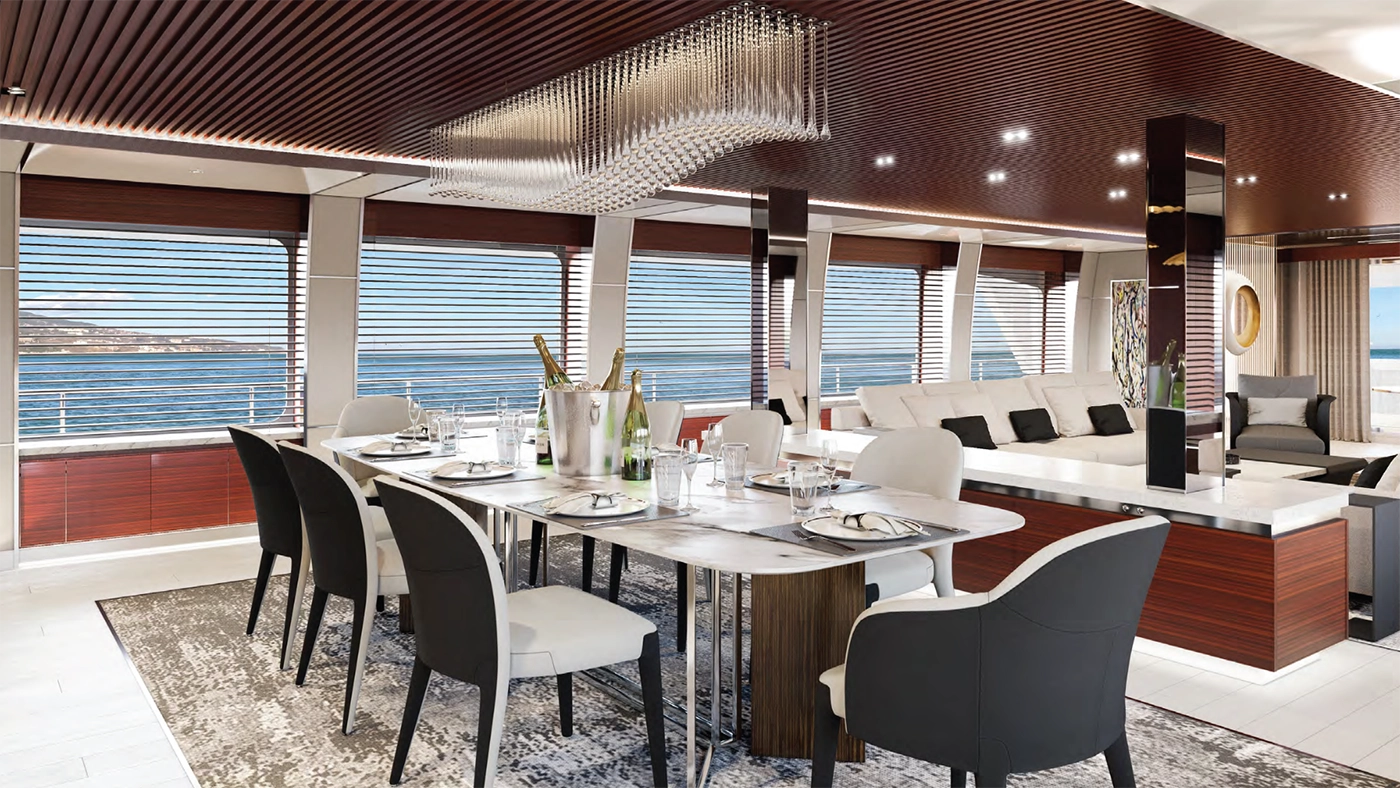 Plush, tailored sofa with ocean views in a yacht’s living area